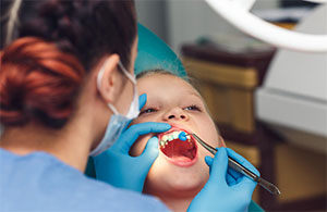 Child getting a dental checkup